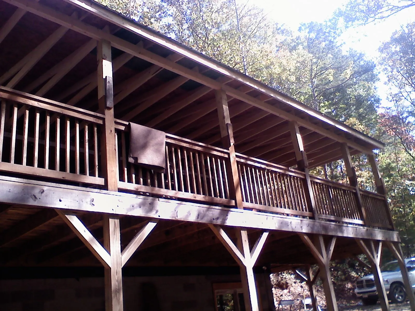 Timber framing under a new elevated porch and deck — Roof Leak Repair in North Manchester by Roofing Brothers